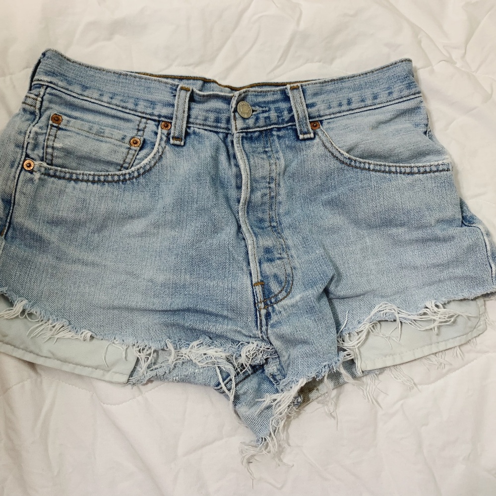 Light wash, distressed Levi jean shorts